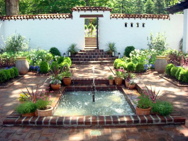 Courtyard garden with potted plants and a fountain